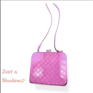 Bottega Veneta Purple Crossbody is more muted/filter made it deeper in color